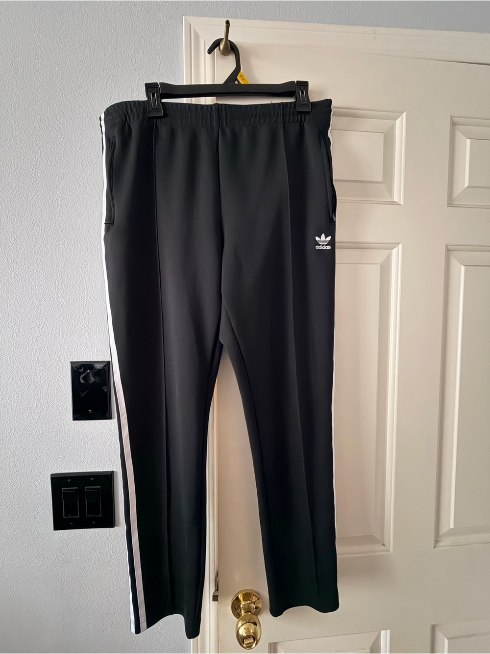 adidas Black Track Pants with White Side Stripes, tailored ankle with zipper